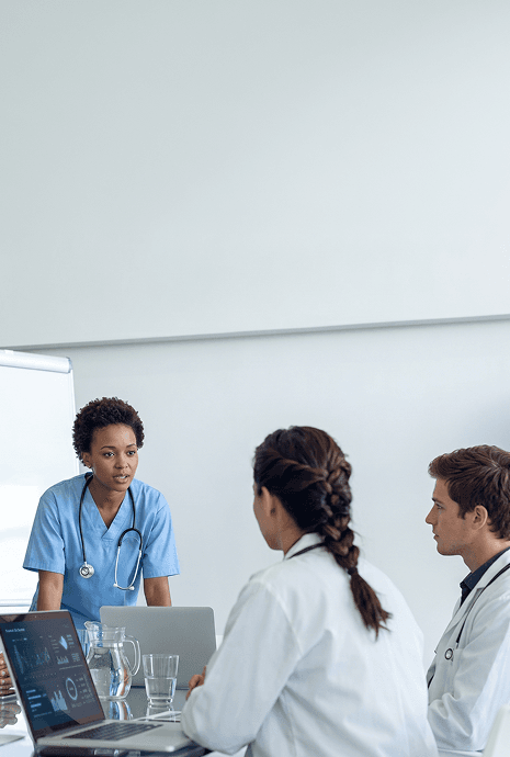Healthcare professionals collaborating on program design